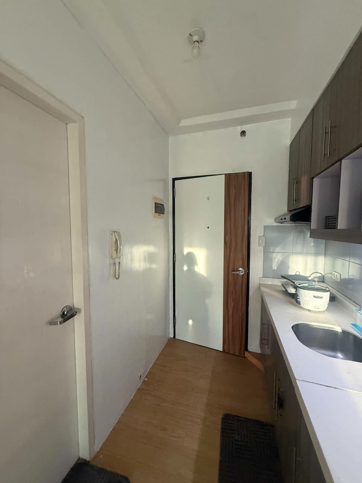 Entry and kitchen · styling only, before